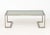 Modern Smoky Glass Top and Silver-Tone Metal Coffee Table, 1970s, rectangular. 15" H x 44.5" W x 22.75" D. Provenance: A...