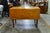 This late 19th-century American Colonial style walnut drop-leaf table features beautifully turned legs and a rich, warm...