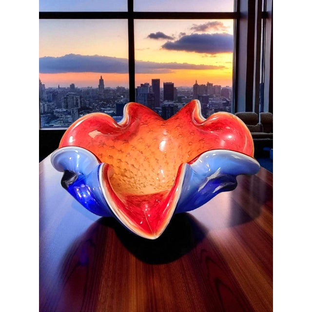 This Vintage Attributed Murano Art Glass Red & Blue Trinket, Candy Dish, Ashtray, Bowl is a handmade piece from Venice,...