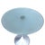 Y2K era side table featuring a floating frosted green glass top resting on a brushed aluminum base. The table echoes the...
