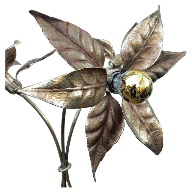 A floor lamp designed by Willy Darro in the Mid Century. The lamp has a Hollywood Regency style featuring a gilded gold...