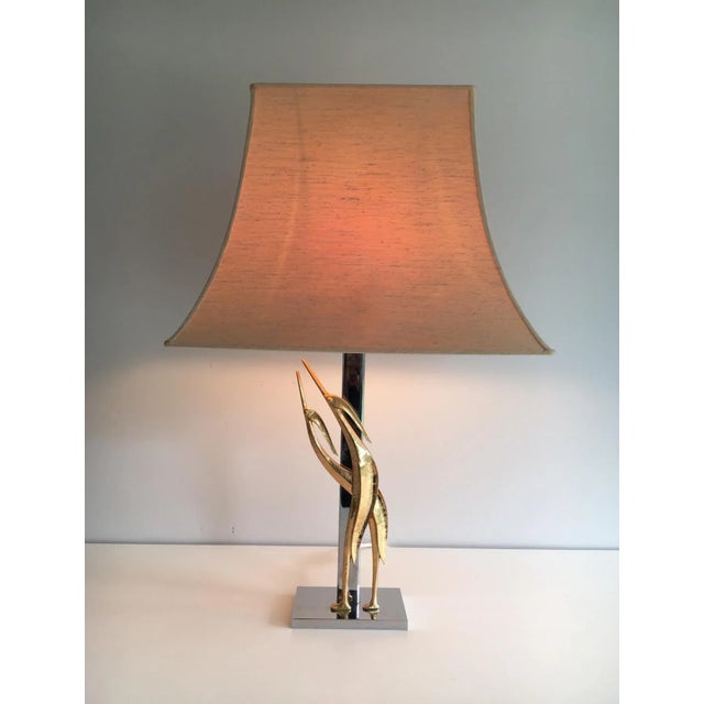 This beautiful lamp is made of chrome with bronze design sculptural birds. This is a French work, circa 1970. Delivery can...