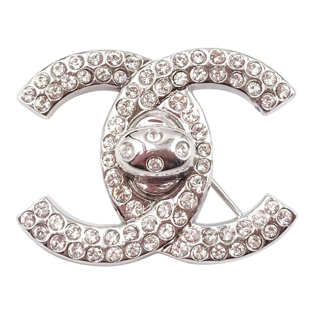 Vintage Chanel Silver CC Crystal Turnlock Brooch For Sale