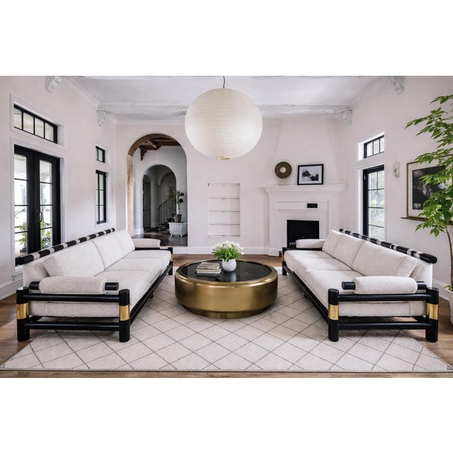 Absolutely stunning pair of pagoda style sofas by Baker Furniture Company. If you are looking for a gorgeous pair of...