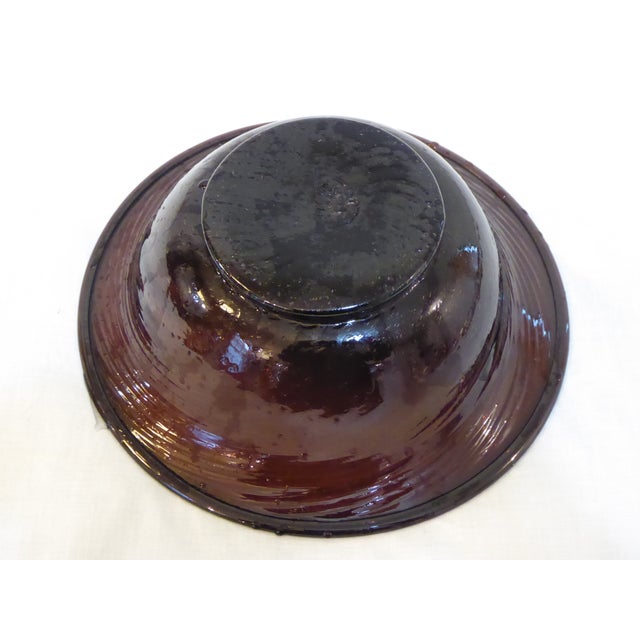 This Antique bowl is blown glass.