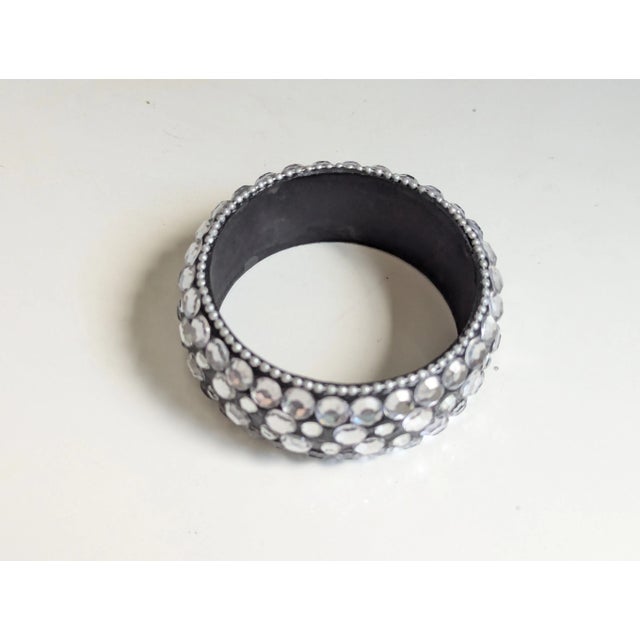 Seller delegated shipping, arrives 4-8 days from purchase. 1980's crystal studded Bangles. It is framed with beaded silver...