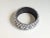 Seller delegated shipping, arrives 4-8 days from purchase. 1980's crystal studded Bangles. It is framed with beaded silver...