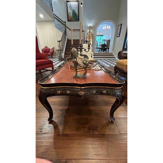 Vintage French Provincial + Chinoiserie Coffee Table of unknown brand, with gold decorative paint.