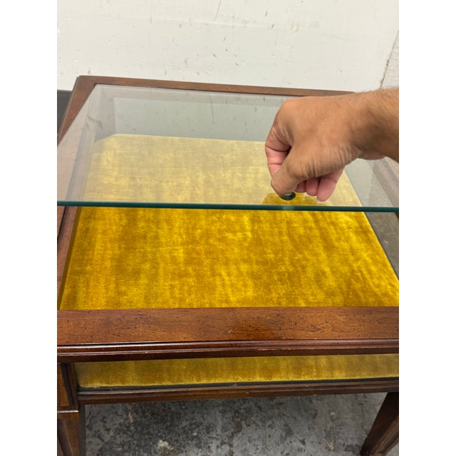 Design Plus Gallery presents a Pair of Vitrine Side Tables by Brandt. The tables have a dark walnut finish and made from...