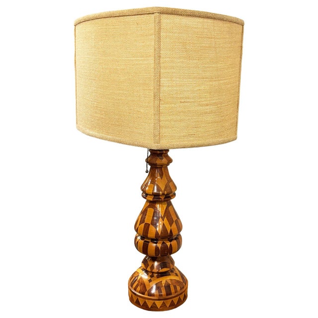 Mid-century patchwork marquetry inlay wood table lamp. The lamp has been hand turned "totem" silhouette with a distinctive...
