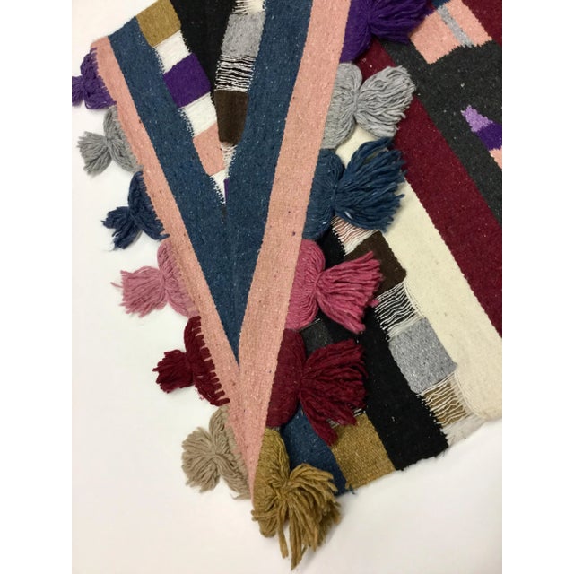 The colors in this vintage piece are magnificent. Hand dyed cotton has been carefully hand loomed into a classic example...