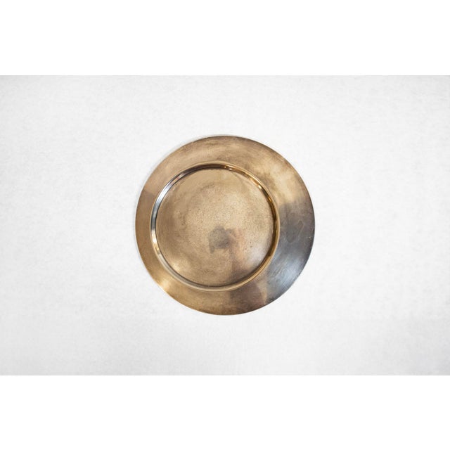 Silver-plated metal plate. Contemporary Shapes Series Designer Gio Ponti Manufacturer Cleto Munari 1970s This piece has an...