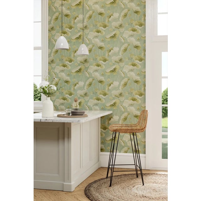 An unusual interpretation of long-stemmed lotus leaves reaching skyward hand drawn by the Sanderson studio. Representing...
