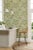 An unusual interpretation of long-stemmed lotus leaves reaching skyward hand drawn by the Sanderson studio. Representing...