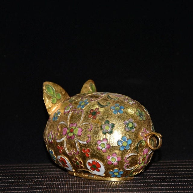 This charming gilt cloisonne pig figurine is handcrafted with fine copper wire inlay work. The surface is covered with...