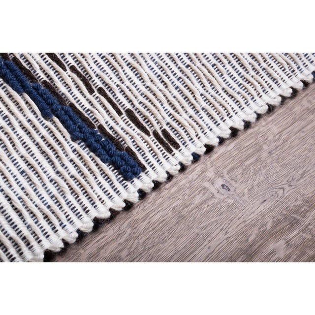 This rug was made by hand using the Pibiones and Litzos techniques. It is made from linen, wool, cotton, and silk, dyed...