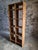 Pine shelving unit from a french workshop, dating from the 1950s. the unit has ten compartments: eight larger cubbies and...