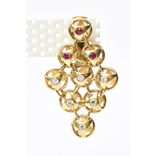 This is part of Chairish’s Fine Jewelry assortment. These stunning pair of French pierced lever back earrings are...