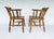 This style of chair was known as a smoker's bow chair, office chair, or Captain's chair. They were often found in offices,...