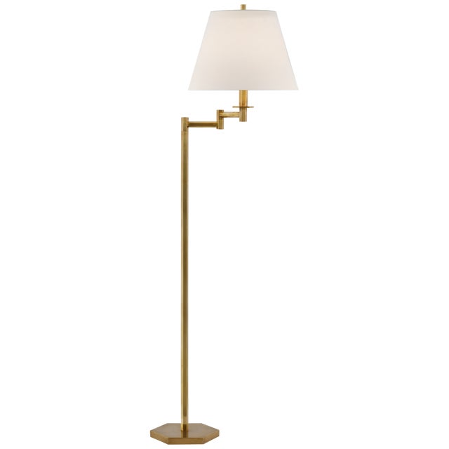 Olivier Large Swing Arm Floor Lamp in Hand-Rubbed Antique Brass with Linen Shade Designer: Paloma Contreras Height: 61"...