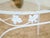 Mid 20th Century Vintage Wrought Iron Patio Dining Table With Leaf Motif Aqua Cushions and Glass Top For Sale - Image 5 of 7