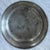 A monumental antique pewter charger or large deep serving platter, notable for its impressive scale, substantial weight,...