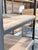A striking Fulton desk by Restoration Hardware, pairing the warmth and natural character of reclaimed elm with a slender...