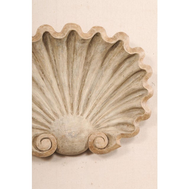A Pair of Carved & Painted Shell Wall Plaques | Chairish