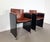 These are pretty rare! A great set of two Arco armchairs on little casters and with cognac leather seats. Almost Italian...