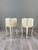 Charming pair of Louis XV style bedside tables in cream lacquered wood with painted decoration. Each table is adorned with...