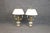 This elegant pair of French neoclassical table lamps beautifully combines the timeless sophistication of carved crystal...