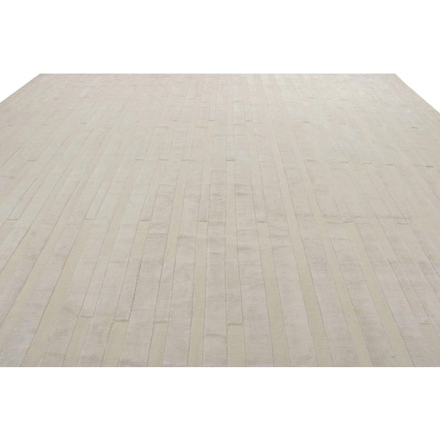 Made with hand-knotted silk, this 9x12 contemporary rug is a rich new addition to Rug & Kilim’s Textural rug...