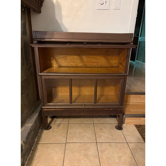 Beautiful early 20th-century modular lawyer's bookcase by the Macey Furniture Co. Features original glass doors that slide...