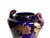 The vase showcases a masterful application of the iconic “bleu de Tours” glaze, a deep cobalt hue emblematic of high-...