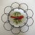 Beautifully hand painted birds on porcelain saucers with a flower design wire frame ready to hang. Although they are not...