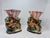 A delightful pair of 1950s mid-century figural ceramic pocket vases featuring an ornate relief motif of a mother doe and...