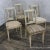 An elegant set of four French Neoclassical style dining chairs dating to circa 1920. Their refined painted frames feature...
