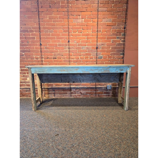 Add a soulful, global touch to your space with this stunning reclaimed wood console. Featuring authentic architectural...