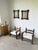 Antique pair of carved wooden mirrors inspired by tramp art, with their sculpted lines and details. We love the floral...