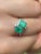 Antique Art Deco platinum ring with natural Emerald center stones. Ring setting is an original Art Deco era mounting. The...