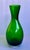 Green Art Glass Vase A striking emerald‑green art glass vase with a beautifully sculpted silhouette. The form transitions...