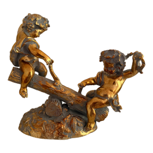 Vintage Sculpture of Gold Colored Cherubs on Log Seesaw