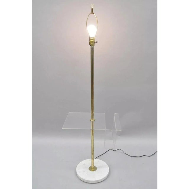 Vintage Mid Century Modern Brass Lucite Marble Floor Lamp with Magazine Table Rack. Item features a lucite magazine/letter...