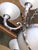Handmade in Europe by Italian artisans. This stately, neo-classical chandelier is superbly executed in cast bronze to...