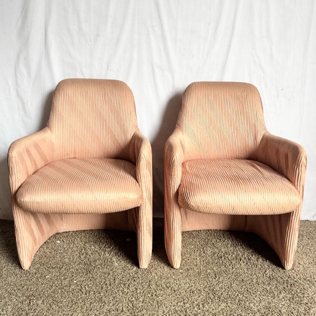 This striking set of six postmodern arm chairs by Preview Furniture captures the sculptural elegance of late-20th-century...