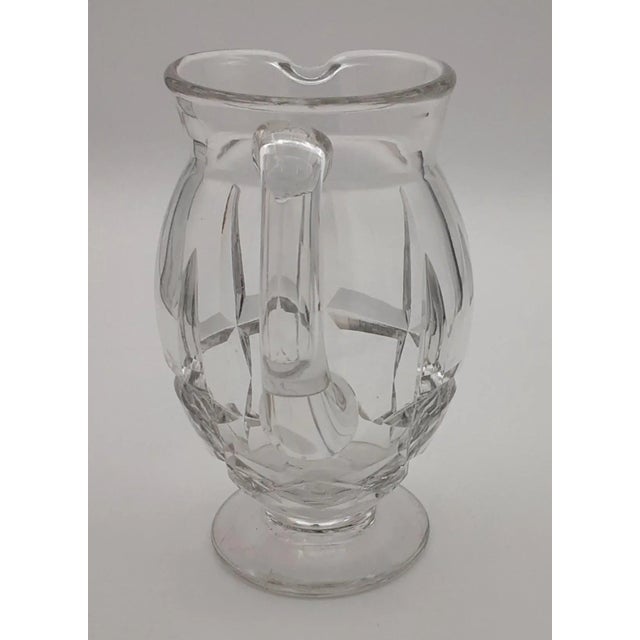 Serve iced tea, water or any other cold beverage in style with this vintage pitcher by Daum. Would also make a lovely...