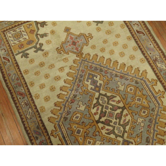 An early 20th century antique Turkish Oushak rug.