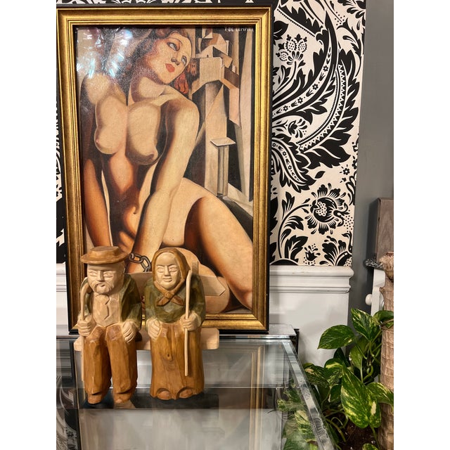 Up for consideration is a beautiful hand carved wooden sitting old couple sculpture. This would look lovely in your home...