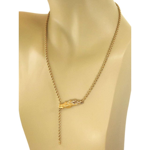 The Carrera y Carrera Diamond 18k Yellow Gold Horse Pendant Rope Necklace is a luxurious piece of fine jewelry crafted in...