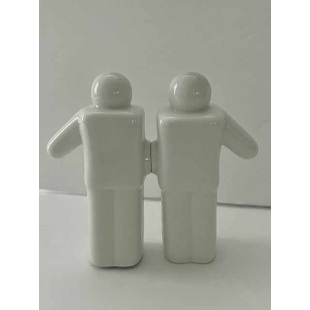 Adorable pair of Ceramic Salt and Pepper Shakers. Never used. The pair are magnetic and join together at the hip. Their...